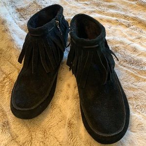 Black suede moccasin booties.
